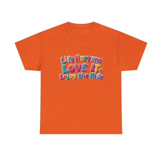 Life Happens Love It Enjoy the Ride Tee in vibrant orange color with colorful text design.