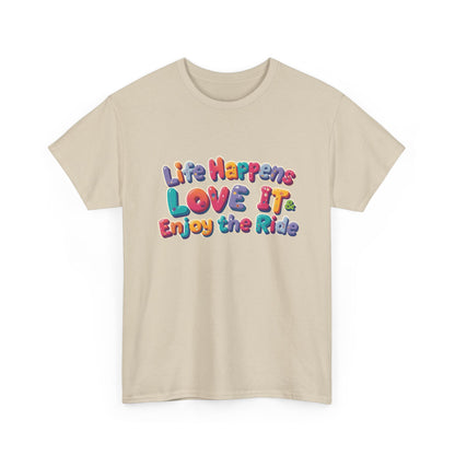 Life Happens Love It Enjoy the Ride Tee featuring colorful graphic text on a beige t-shirt.